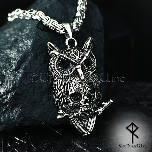 Silver owl and skull pendant