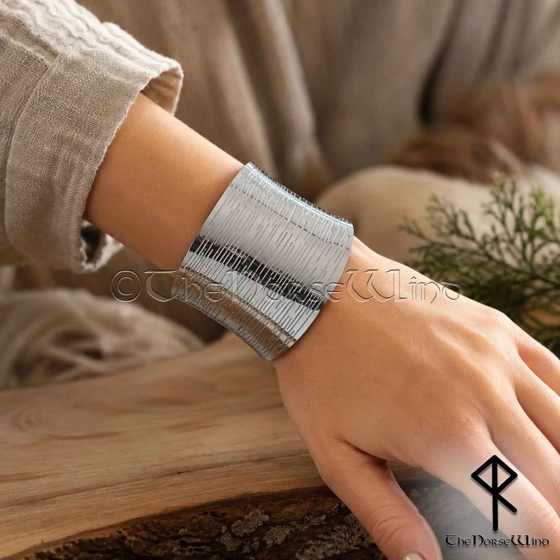 Wide Viking cuff bracelet for women in stainless steel worn on wrist