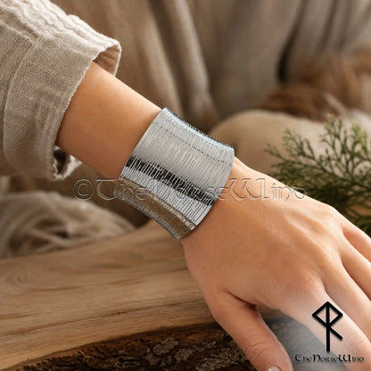Wide Viking cuff bracelet for women in stainless steel worn on wrist