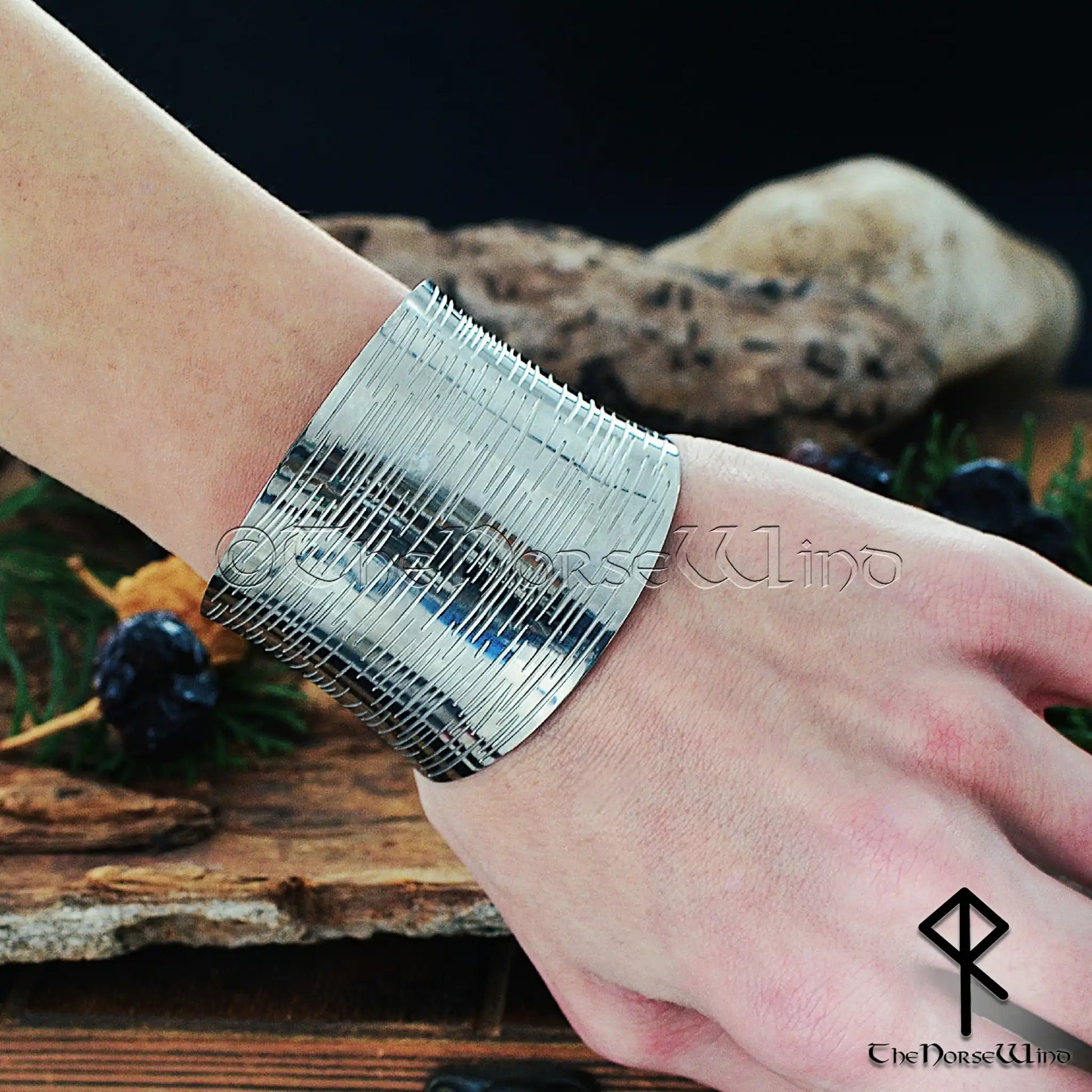 Wide Viking cuff bracelet for women in stainless steel worn on wrist