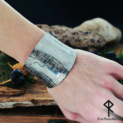 Wide Viking cuff bracelet for women in stainless steel worn on wrist
